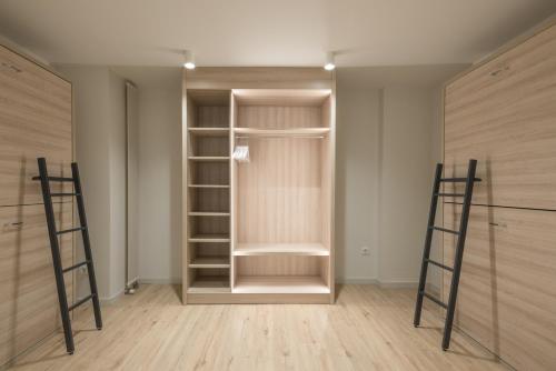  Hotel & Aparthotel Cosmos -  Room  picture :   Shower    Safety deposit box    TV                           