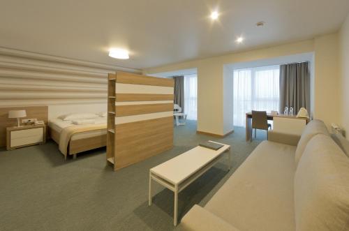 Кровать или кровати в номере Отель Волга