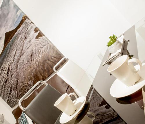 エル・メダノにあるLa Perla Médano 3のバスルーム(洗面台、トイレ付)が備わります。