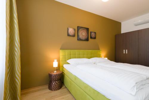 Кровать или кровати в номере Vienna Stay Apartments Pezzl 1170