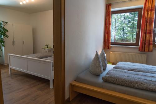 Postel nebo postele na pokoji v ubytování Appartement Lasshofer