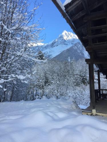 a view from a cabin in the snow at Chalet Heron in Les Houches
