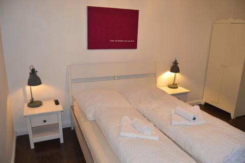 Postel nebo postele na pokoji v ubytování St. Pauli Lodge