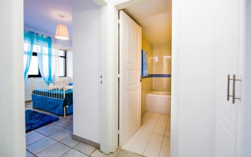 Postel nebo postele na pokoji v ubytování Krasas Beach Apts