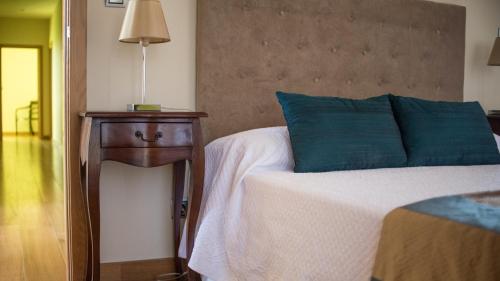 Uma cama ou camas num quarto em Casa Libélula - Serra da Estrela