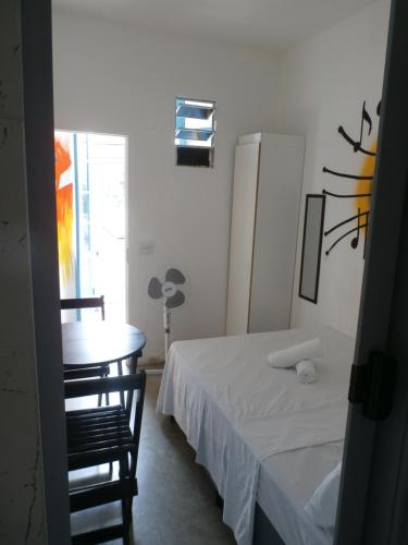 Cama o camas de una habitación en Balcony Hostel Hotel