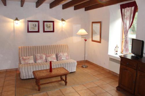 A seating area at Ferme Saint Christophe