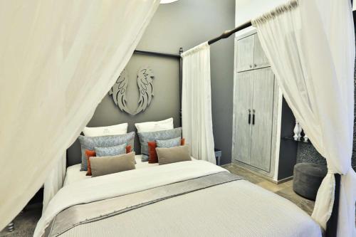 En eller flere senge i et værelse på Riad Raoud Rayhane