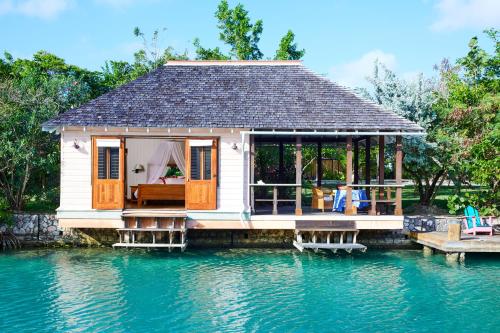 a house on a floating dock on the water at GoldenEye in Oracabessa