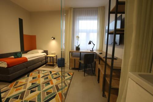 Posteľ alebo postele v izbe v ubytovaní Apartamenty Garbary 3