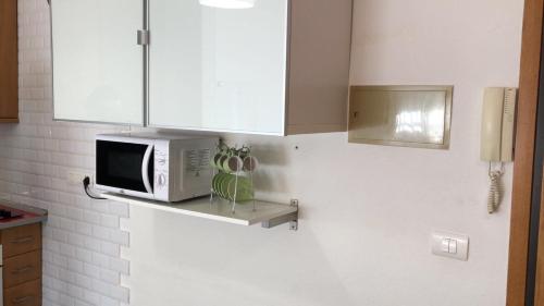 A kitchen or kitchenette at SI Apartamentos Benicassim