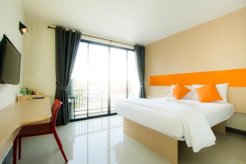 Ένα ή περισσότερα κρεβάτια σε δωμάτιο στο The Lephant Hotel