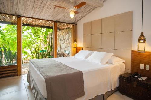 Cama ou camas em um quarto em Hotel de Lençois