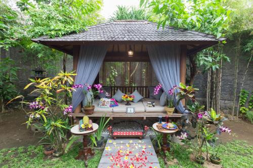 Κήπος έξω από το Villa Kampung Kecil Boutique Hotel