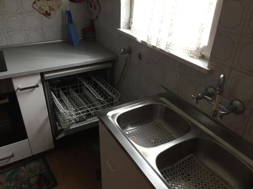Kuchyň nebo kuchyňský kout v ubytování Bellamonte Mar