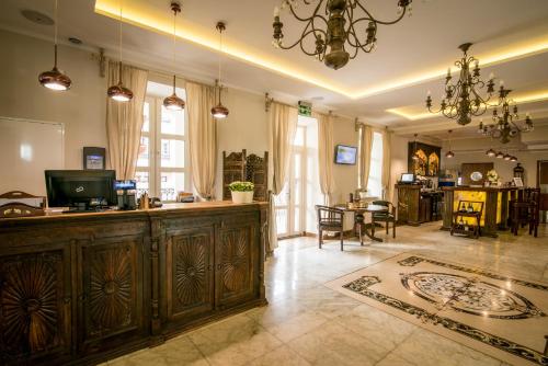 a large room with a kitchen and a dining room at Orient Palace in Bielany Wrocławskie
