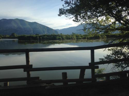 a view of a lake with mountains in the background at B & B Da Giusy in Corte Franca