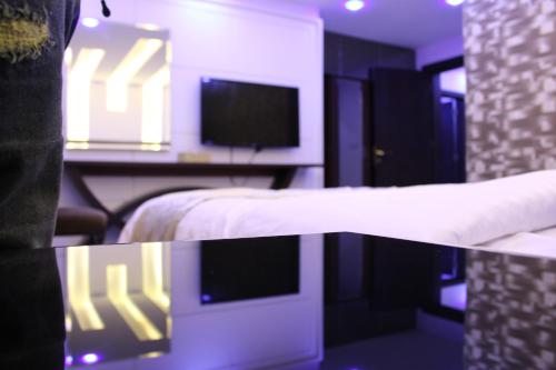 Televisyen dan/atau pusat hiburan di Sama Hotel