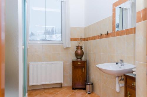Koupelna v ubytování Penzion SPORTINO