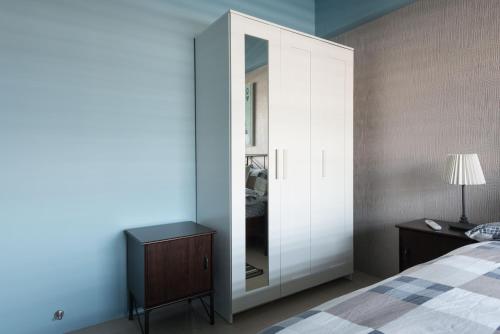 Postel nebo postele na pokoji v ubytování LiveGRACE Apartment Xindian