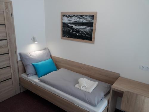 a room with a bench with two pillows at Apartment Jasna - Lucky in Demanovska Dolina