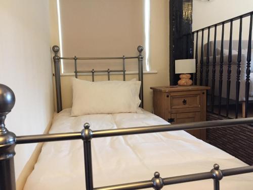 Posteľ alebo postele v izbe v ubytovaní Findon Rest Ltd