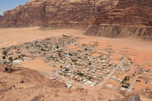 an aerial view of a village in the desert at Climbers House in Wadi Rum in Wadi Rum