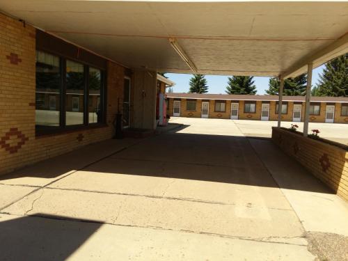 an empty hallway of a school building at Budget Host 4U Motel in Bowman