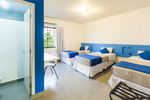 Voodi või voodid majutusasutuse Concept Design Hostel & Suites toas