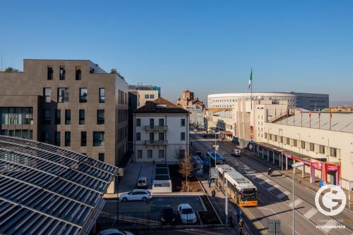 a view of a city street with a bus at YPApartments FIERA in Padova