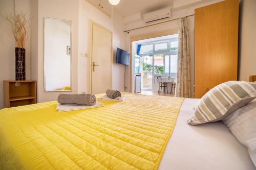 Postel nebo postele na pokoji v ubytování Apartments Zanze