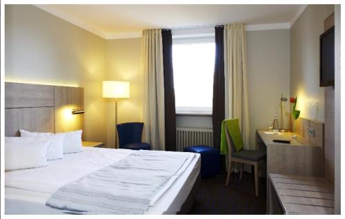 Postel nebo postele na pokoji v ubytování Stern Hotel Soller