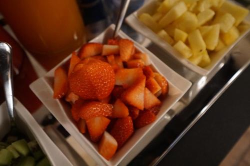 a tray of fruit with strawberries and other fruits at P 1779 in Venice