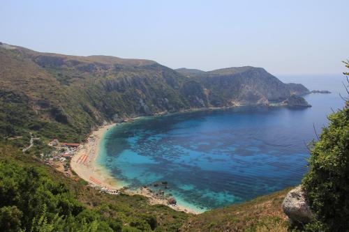 a view of a beach on a hill at stunning tranquil villa with private pool in Sami