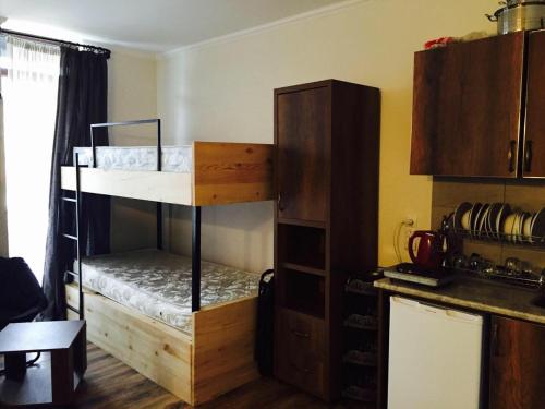 a room with two bunk beds in a kitchen at Ski Resort Bakuriani in Bakuriani