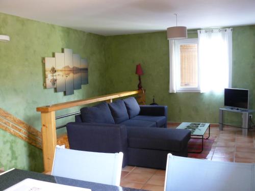 Appartement dans maison Entre Savines et Embrunにあるシーティングエリア