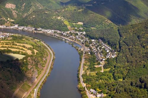 an aerial view of a river and a town at Pension "Haus am Walde" Brodenbach, Mosel in Brodenbach