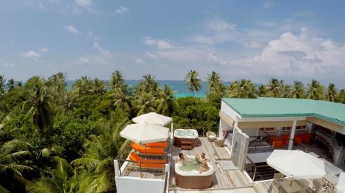 an aerial view of a resort with a hot tub at Bliss Dhigurah in Dhigurah