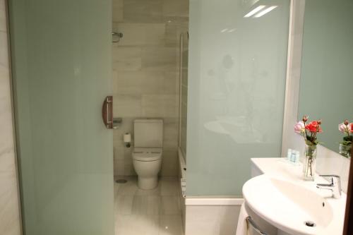 Ett badrum på Hotel - Restaurante Casa Rosita