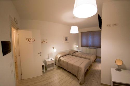 Ein Bett oder Betten in einem Zimmer der Unterkunft Lenotti Bed and Breakfast