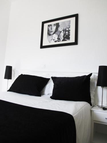 Una cama o camas en una habitación de Varchotel