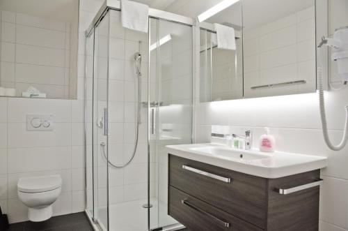 Koupelna v ubytování Apartment Alpeglöggli - GRIWA RENT AG