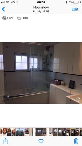 a screenshot of a kitchen with a picture of a room at House in Hounslow