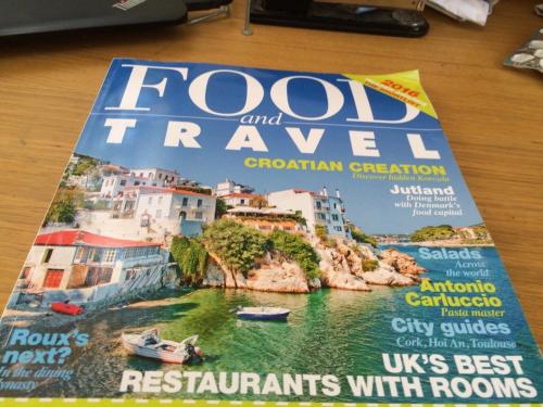 a magazine sitting on top of a table at Jabajak Vineyard Restaurant & Rooms in Whitland