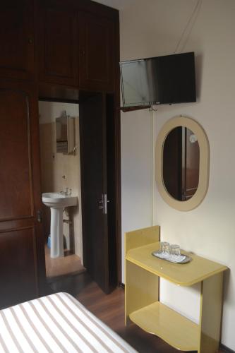 TV a/nebo společenská místnost v ubytování Hotel Nelly