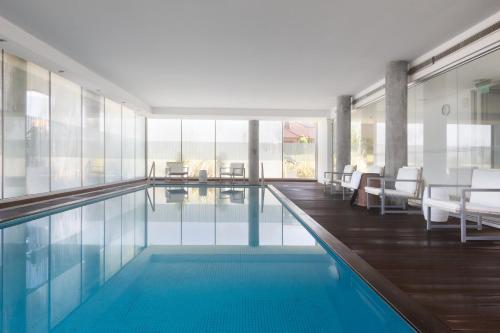 Bazén v ubytování Real Colonia Hotel & Suites nebo v jeho okolí