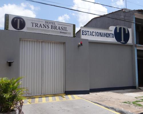 a building with a sign on the side of it at Hotel Transbrasil in Belém