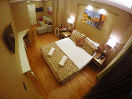 an overhead view of a living room with a couch at Hotel Iz in Izmir