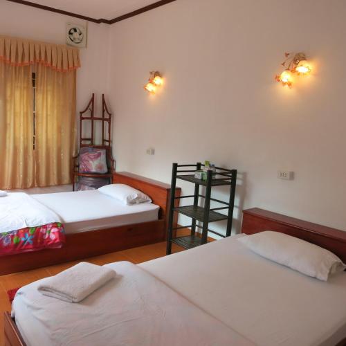 Katil atau katil-katil dalam bilik di Kongkeo Guesthouse