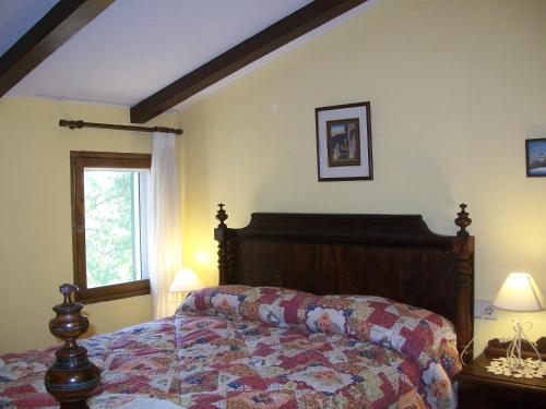 Ένα ή περισσότερα κρεβάτια σε δωμάτιο στο Ca´n Brusquer